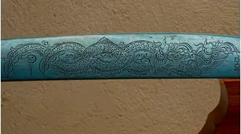Gravures sur la lame en Lek Nam Phee