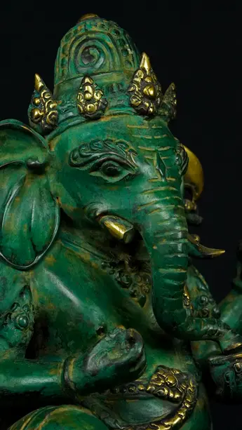 Détail du visage de Ganesh vert