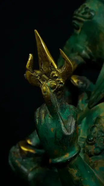 Détail d’un attribut tenu par Ganesh vert