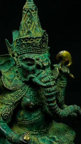Détail du visage de Ganesh vert