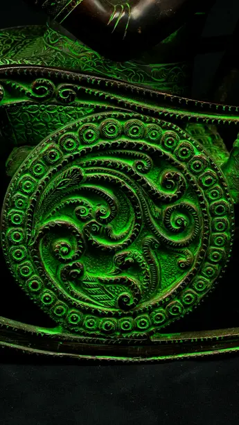 Détail du décor circulaire du siège de Ganesh
