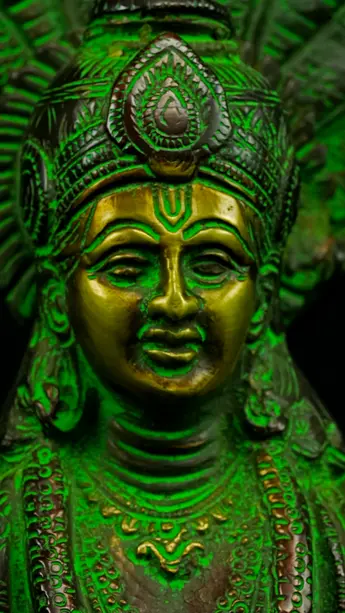 Détail du visage de Dhanvantari