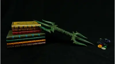 Trishula Vajra vert présenté sur des livres