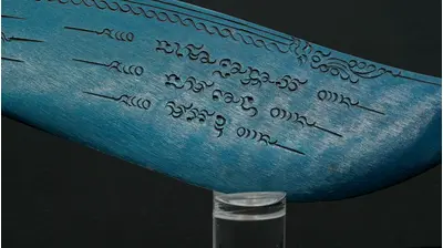 Inscriptions gravées sur la première face de la lame
