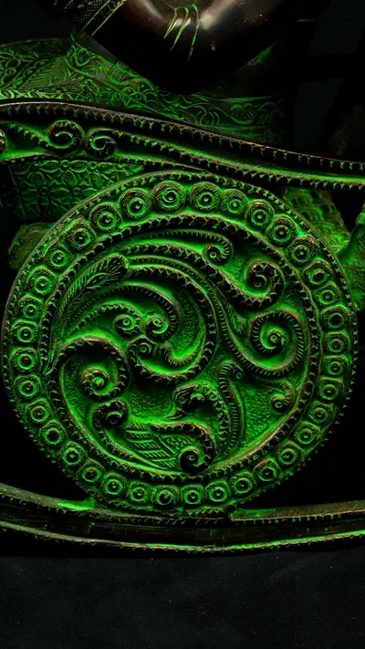 Détail du décor circulaire du siège de Ganesh
